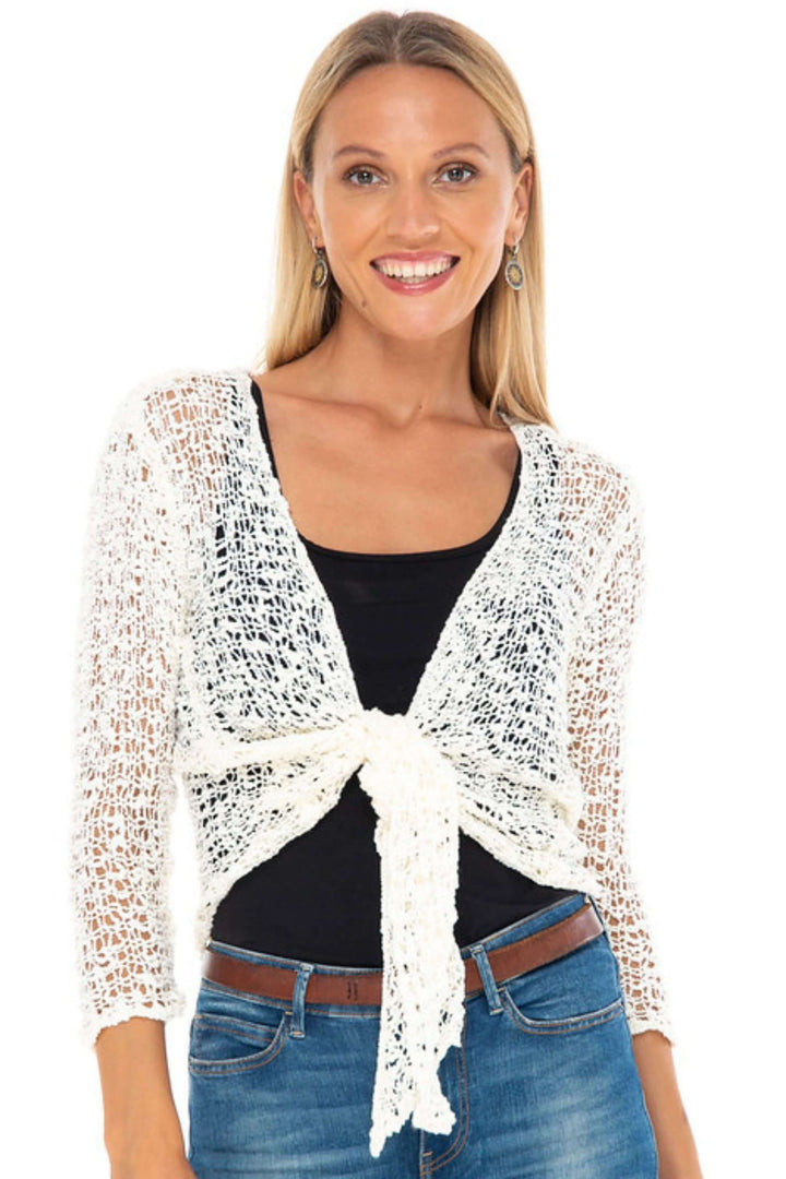 SHU-SHI Off-White tie Front Knitted Shrug with Open Weave modeled over black tank &amp; jeans 