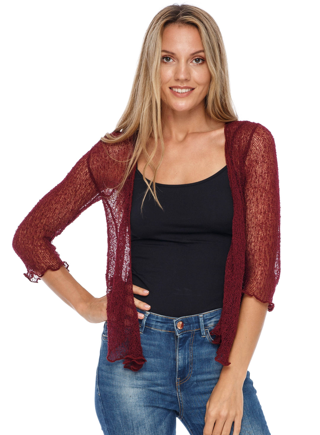 A woman modeling a sheer, open-front SHU-SHI cardigan in maroon over a black tank top and blue jeans, shot against a solid white background.